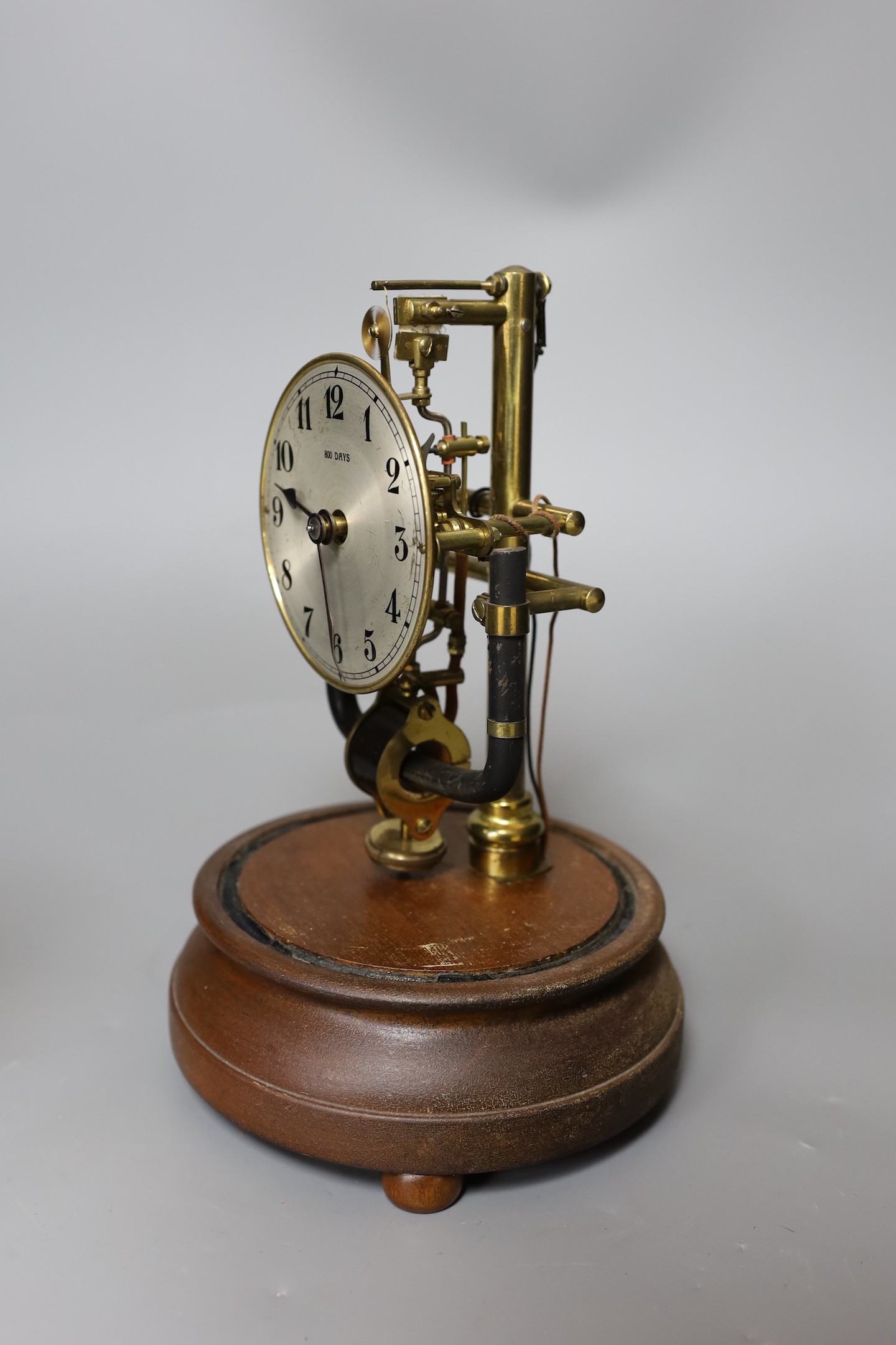 A Bulle electric clock under a glass dome, 28 cms high